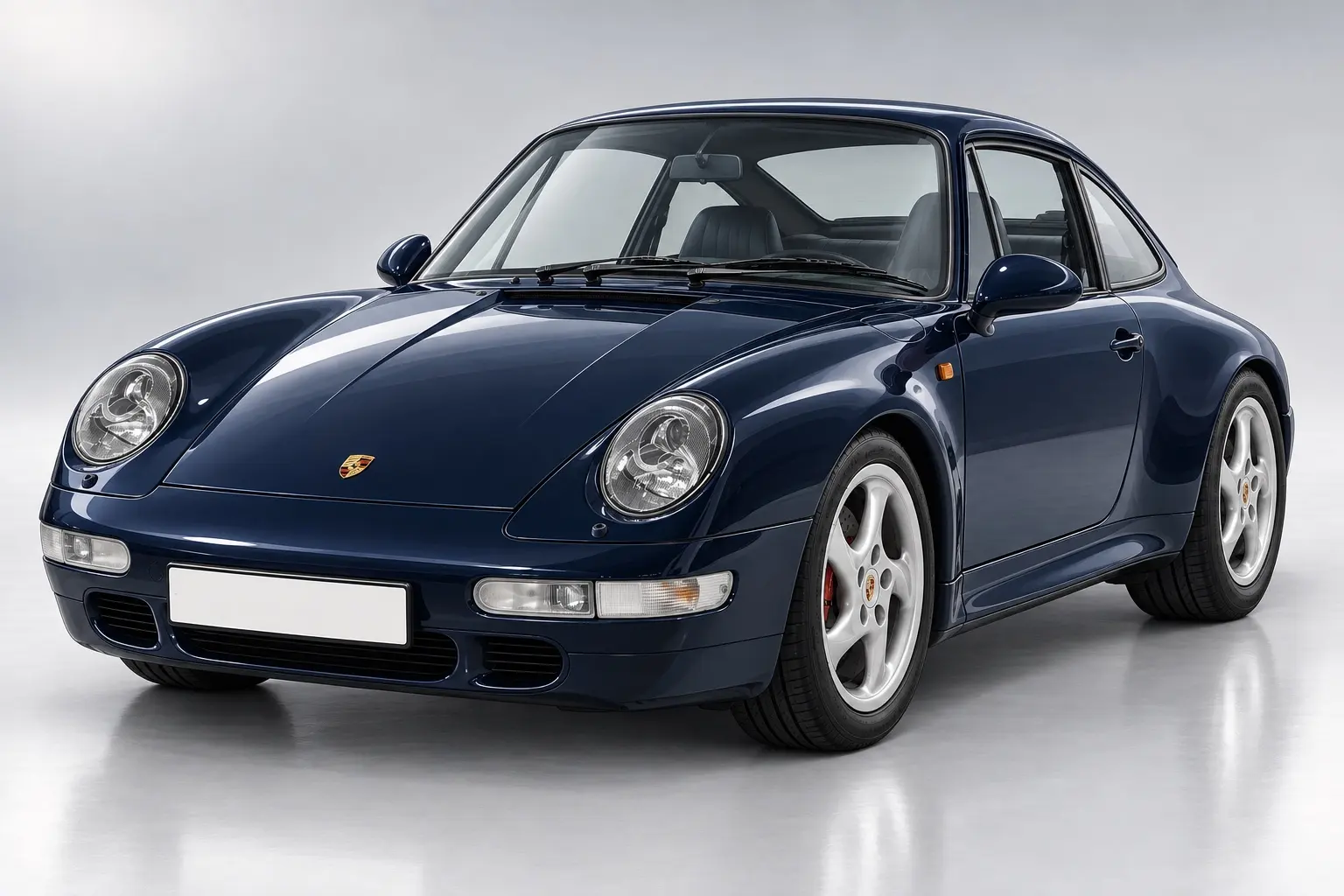 ポルシェ 993型911を斜め前から見たイラスト。低く寝かせた楕円形のヘッドライト、なめらかに張り出したリアフェンダー、ボディ同色のバンパー。濃い青のボディ