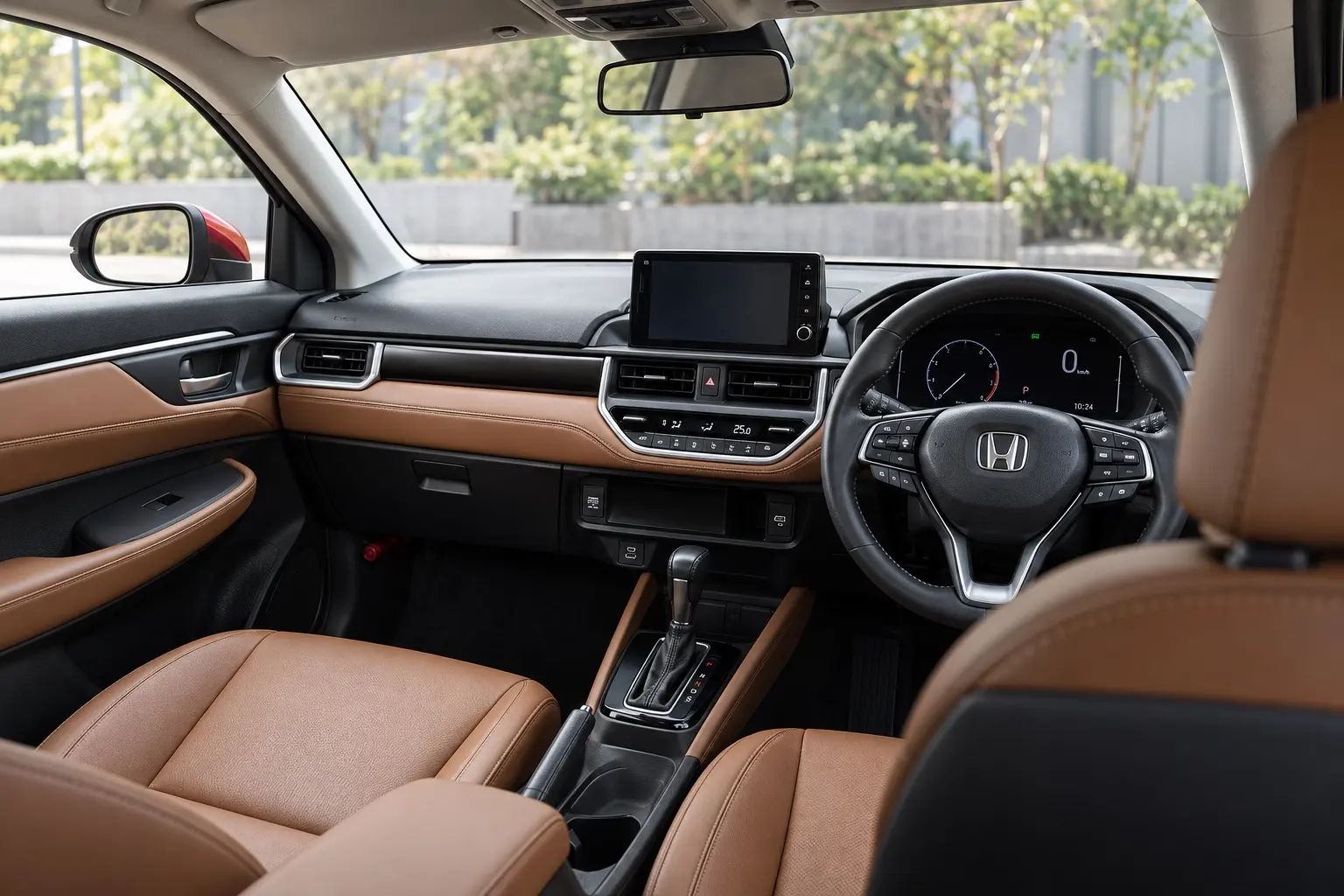 ホンダ WR-V Z＋の室内。水平基調のダッシュボード、7インチのデジタルメーター、ブラウンのフルプライムスムースシートが見えるカット。運転席側から助手席側を見たカット